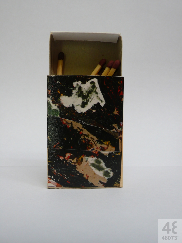 Small abstract painting on matchbox.