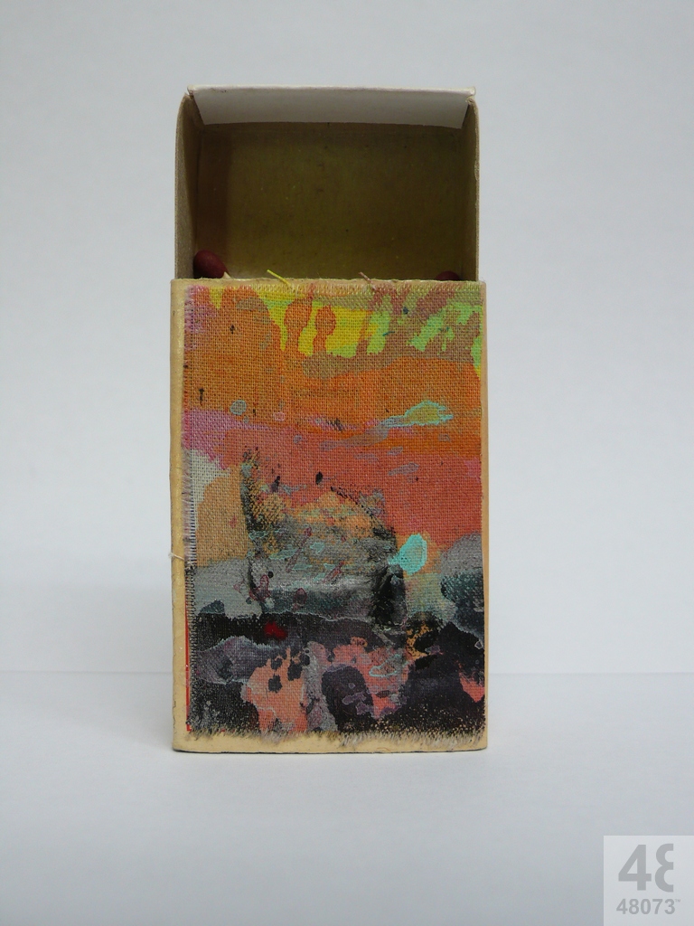 Small abstract painting on matchbox.