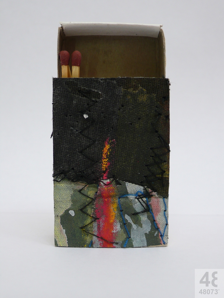 Small abstract painting on matchbox.