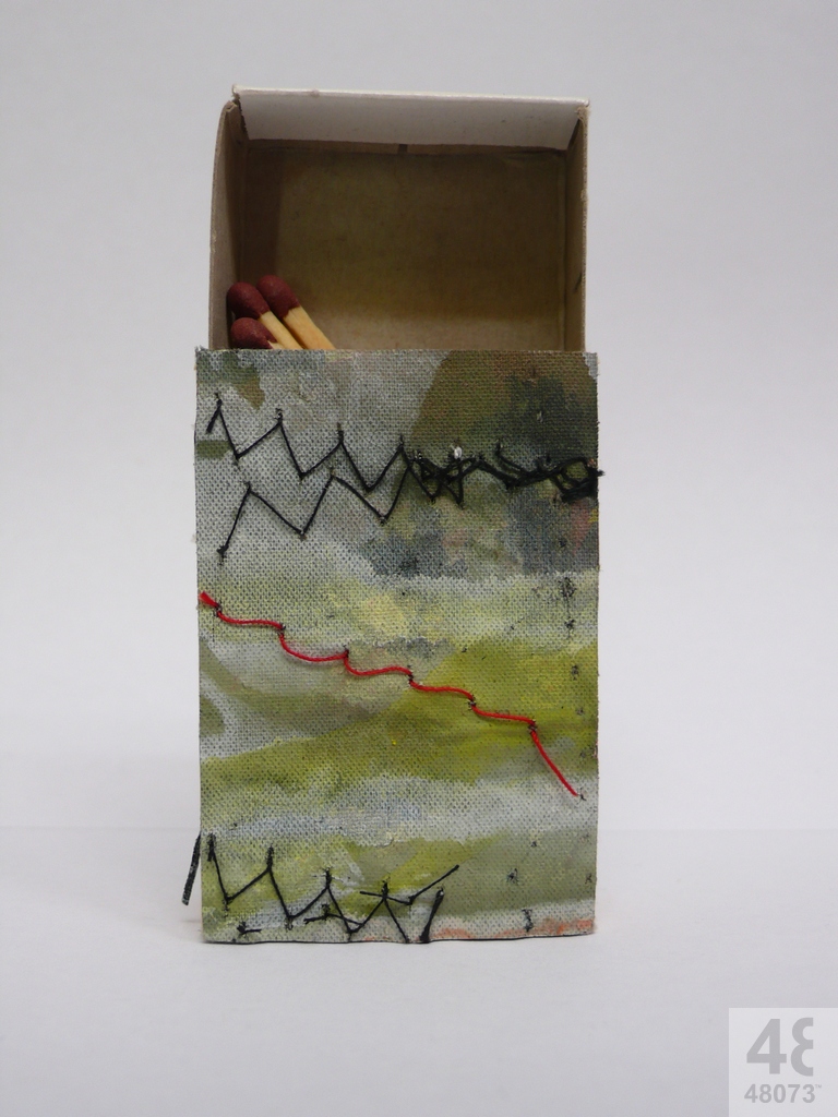 Small abstract painting on matchbox.