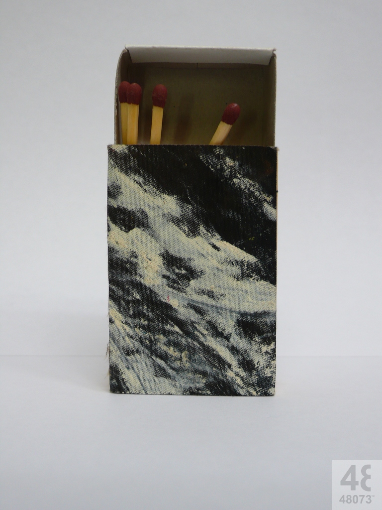 Small abstract painting on matchbox.