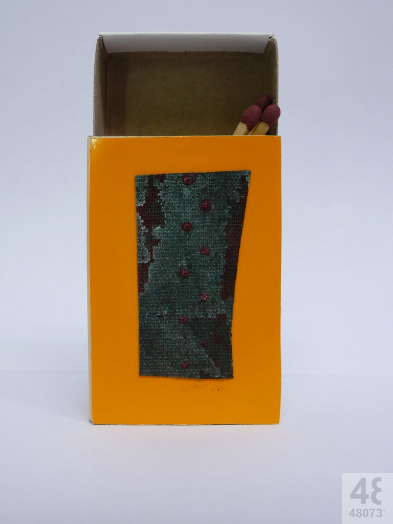 Small abstract painting on matchbox.