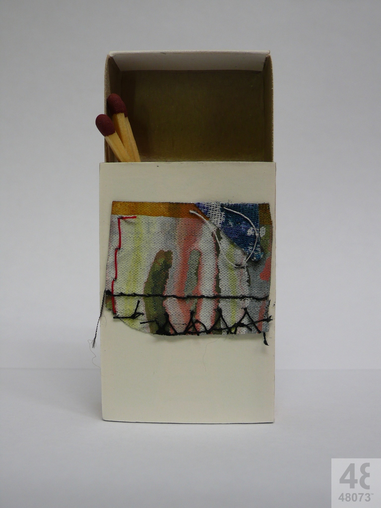 Small abstract painting on matchbox.