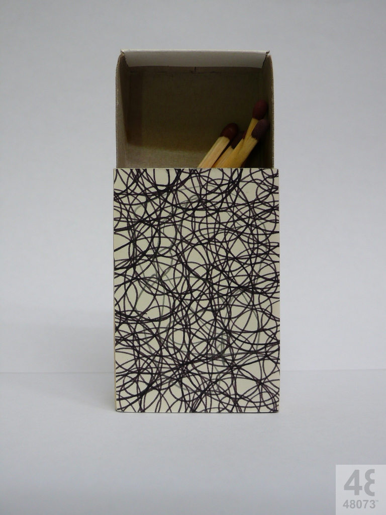 Small abstract painting on matchbox.