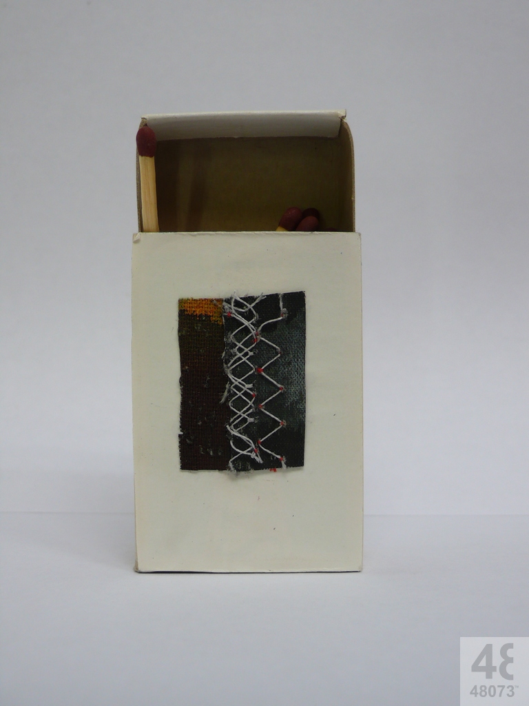 Small abstract painting on matchbox.