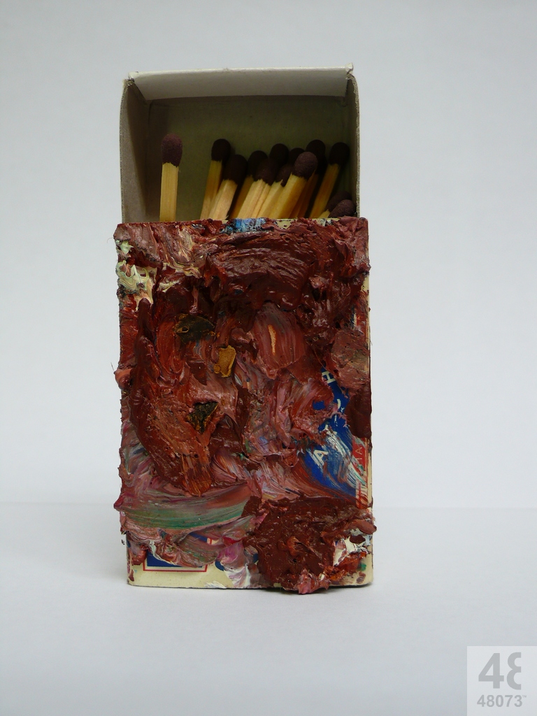 Small abstract painting on matchbox.