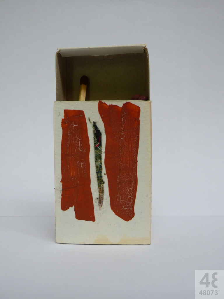 Small abstract painting on matchbox.