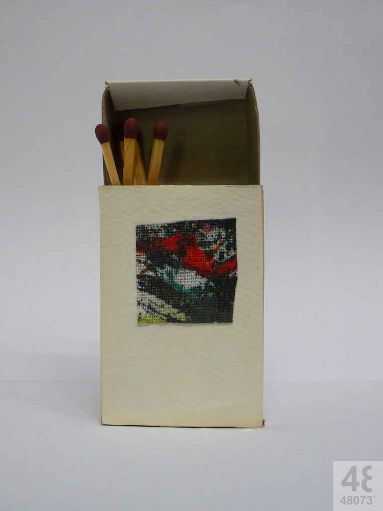 Small abstract painting on matchbox.