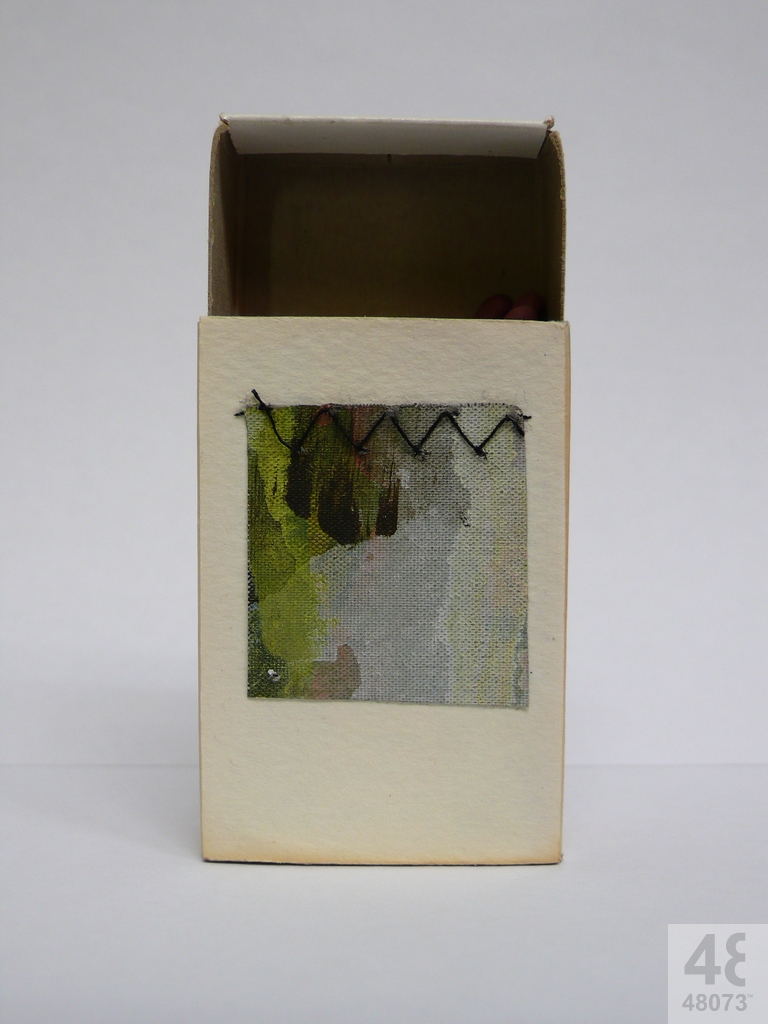 Small abstract painting on matchbox.